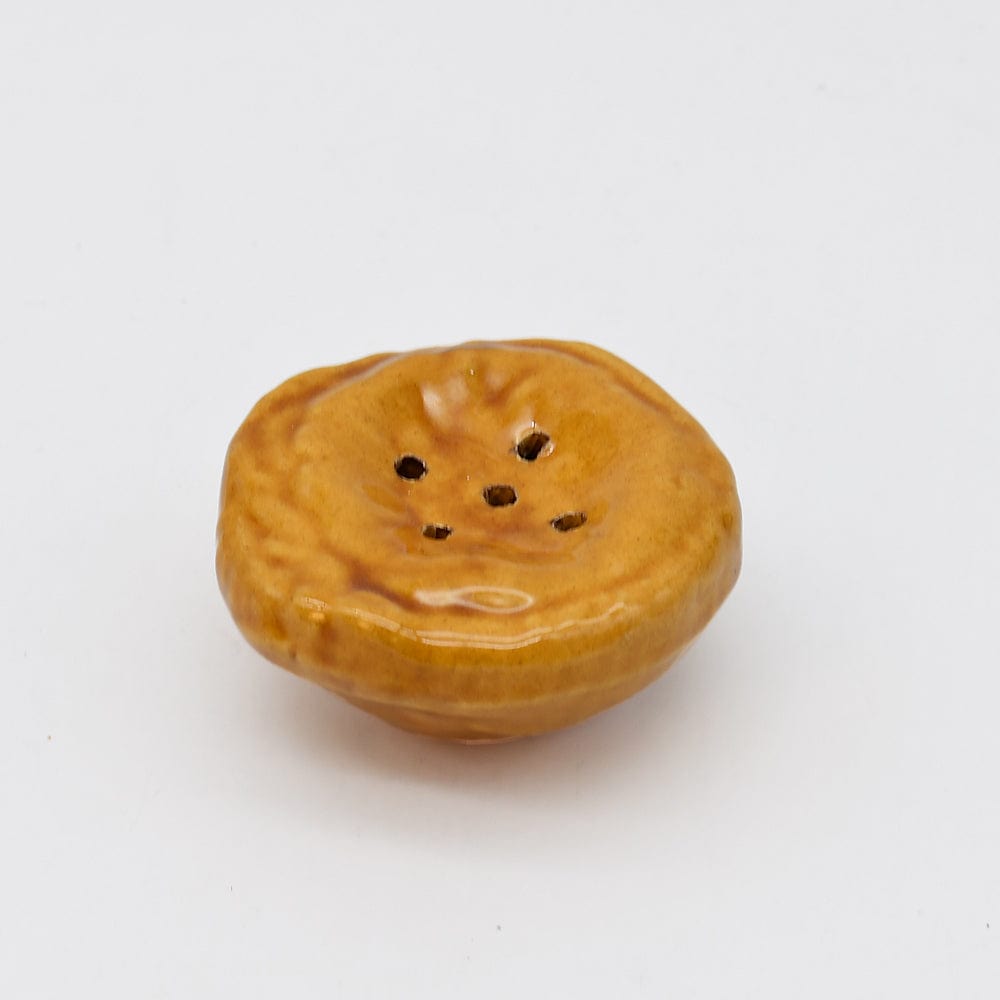 Distributeur de cannelle en forme de Pasteis de Nata Distributeur de cannelle en forme de Pasteis de Nata