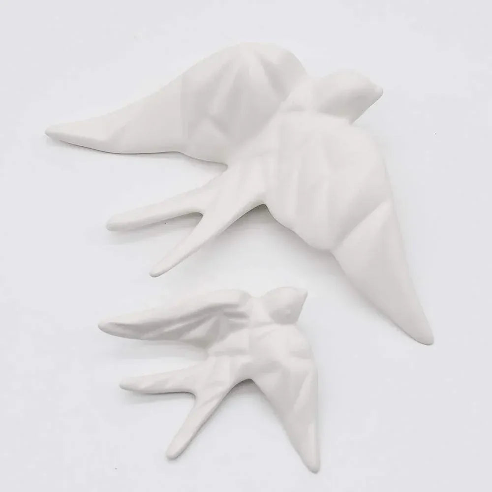 hirondelle en céramique stylisée et modernisée blanche, dans sa boîte cadeau Luisa Paixão. Coffret hirondelle stylisée - Blanc