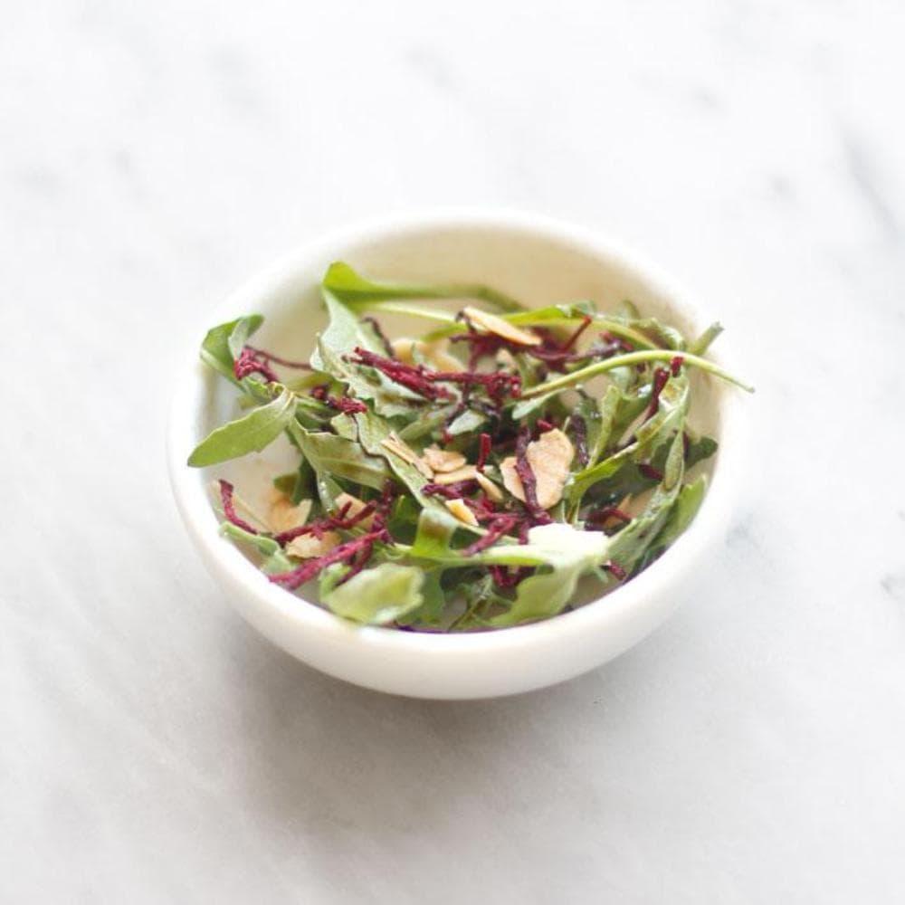 Tube of dehydrated beets and toasted almonds