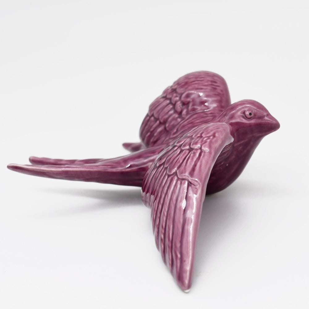 Hirondelle de Caldas da Rainha en céramique mauve