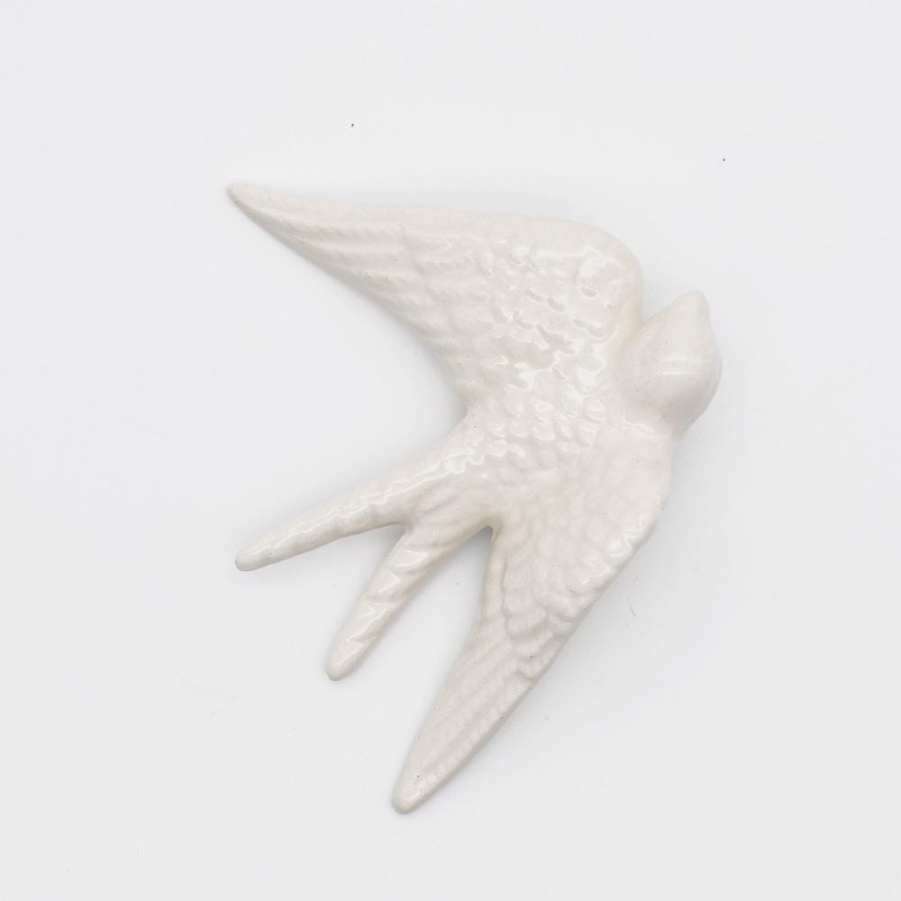 Hirondelle portugaise traditionnelle en céramique blanche Hirondelle traditionnelle en céramique blanche