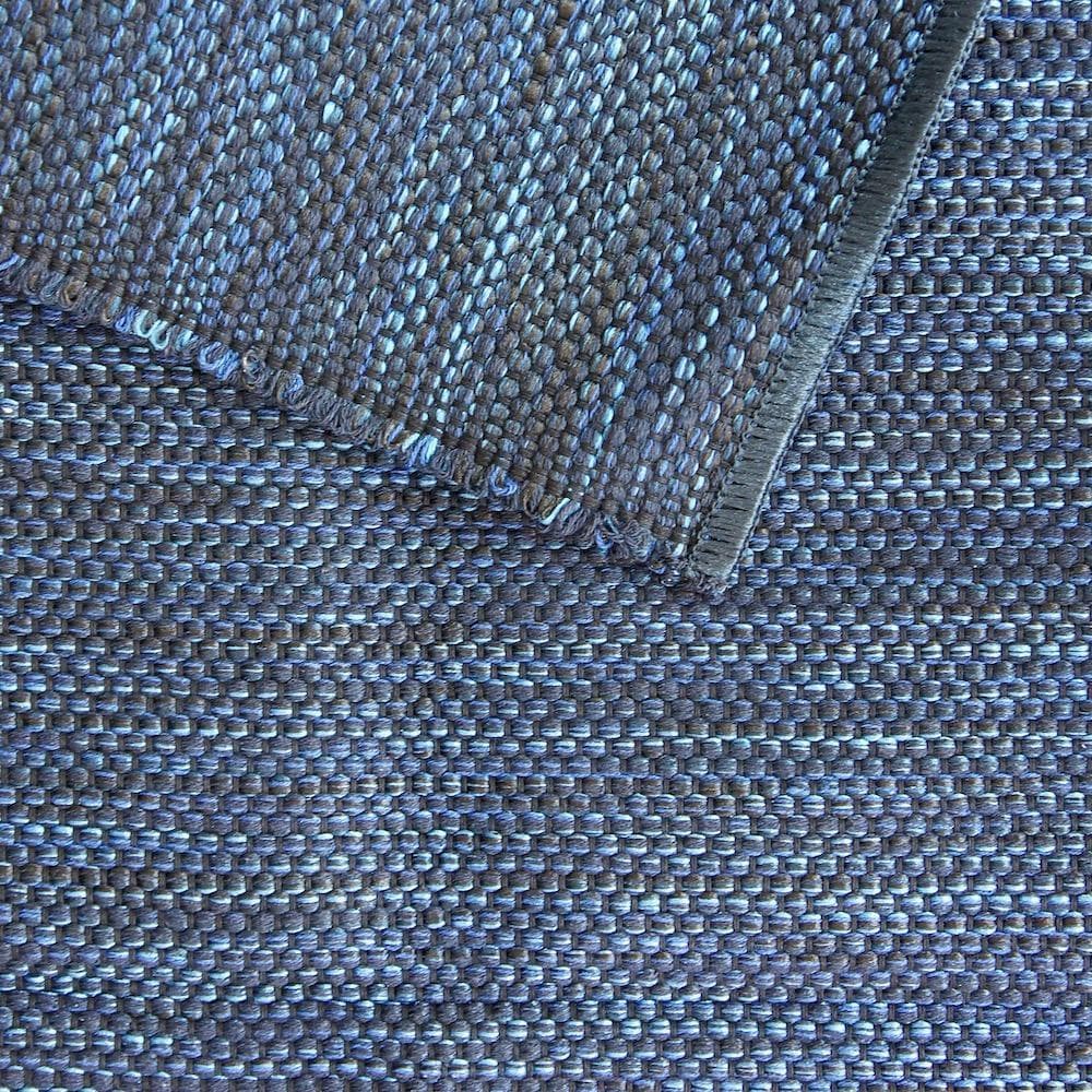 Regional dark blue cotton rug