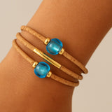 Bracelet en liège et 2 perles turquoise Bracelet en liège et perles - Turquoise