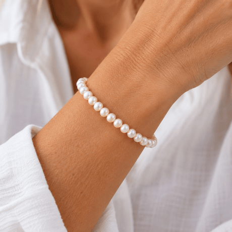 Bracelet en perles blanches avec fermoir doré Bracelet de perles blanches