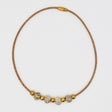 Collier en liège et 4 perles grises élégant et artisanal Collier en liège et perle
