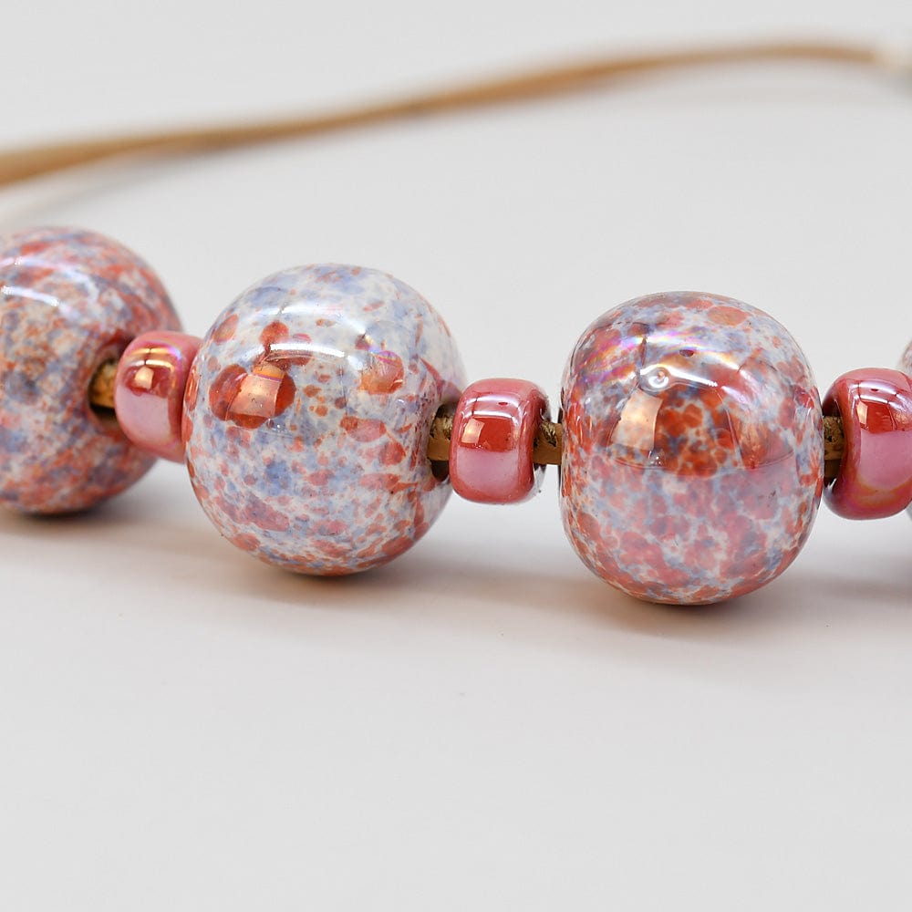 Collier en liège et 4 perles roses Collier en liège et perles - Rose