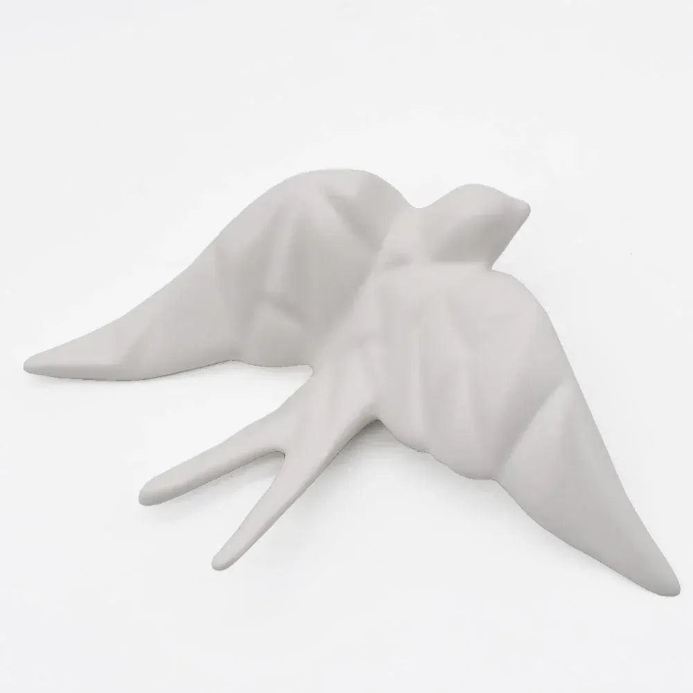 hirondelle en céramique stylisée et modernisée blanche, dans sa boîte cadeau Luisa Paixão.  Coffret hirondelle stylisée - Blanc