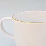 Mug en porcelaine blanche à bord doré – Fabriquée au Portugal Mug en porcelaine "Resonance"