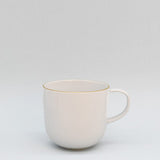 Mug en porcelaine blanche à bord doré – Fabriquée au Portugal Mug en porcelaine "Resonance"