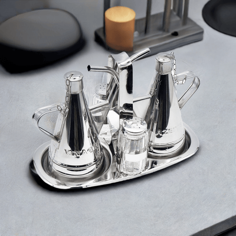 Présentoir à huile. vinaigre. sel et poivre en inox Présentoir à huile. vinaigre. sel et poivre en inox