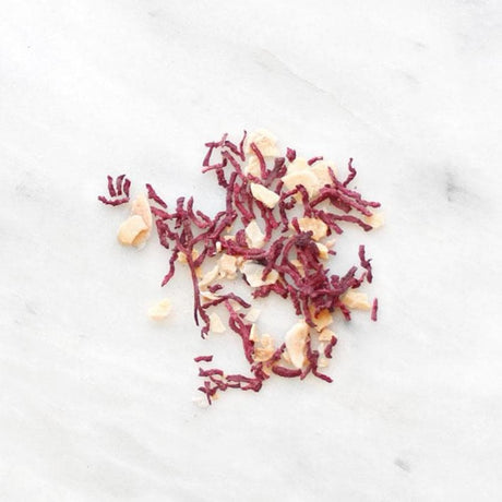 Tube of dehydrated beets and toasted almonds