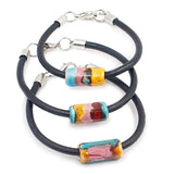 Ceramic bracelet on  leather : Turqoise-blue, pink and yellow
