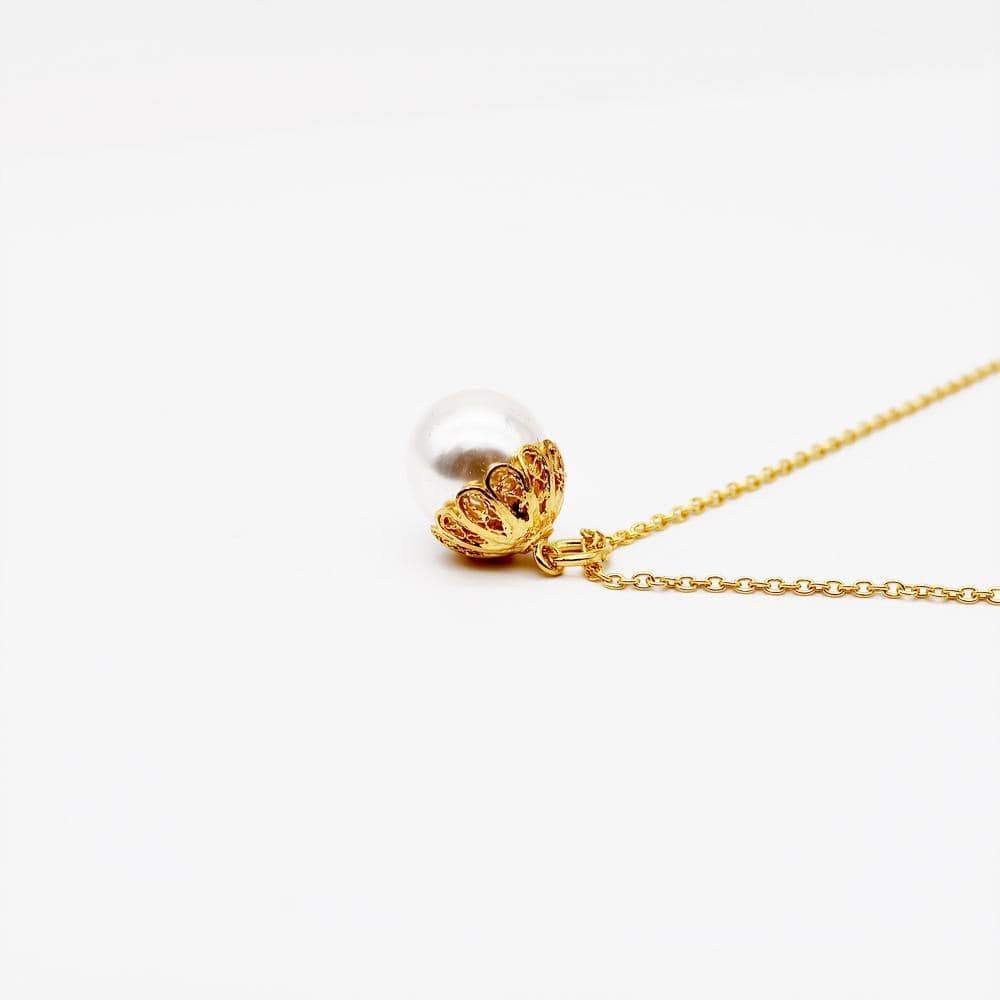 Collier de perle et filigrane d'argent doré