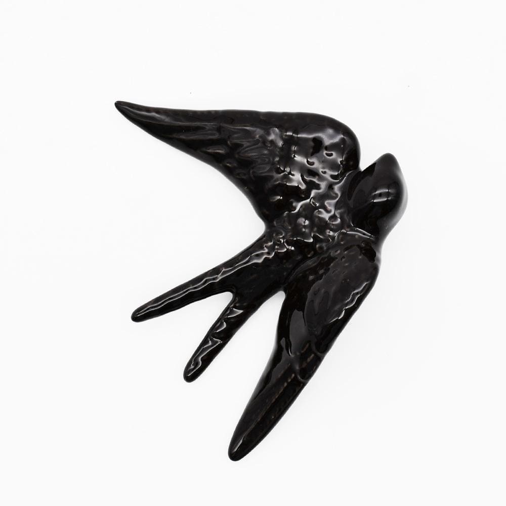 Traditional black ceramic swallow