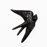 Traditional black ceramic swallow