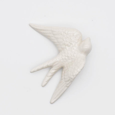 Hirondelle portugaise traditionnelle en céramique blanche Hirondelle traditionnelle en céramique blanche