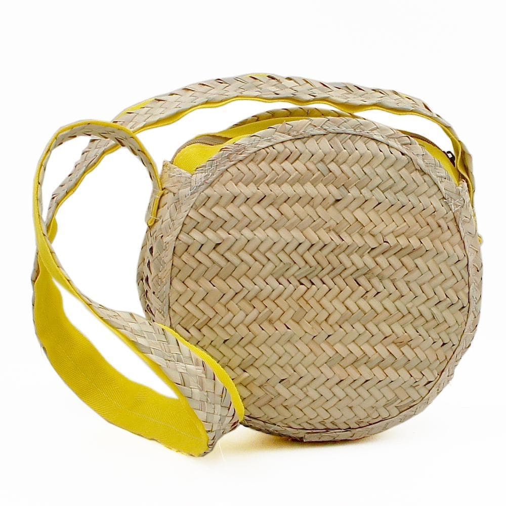 Round shoulder bag in woven straw