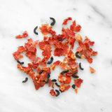 Tube of dehydrated Tomatoes and Black Olives