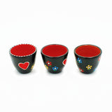 Painted and varnished clay vase